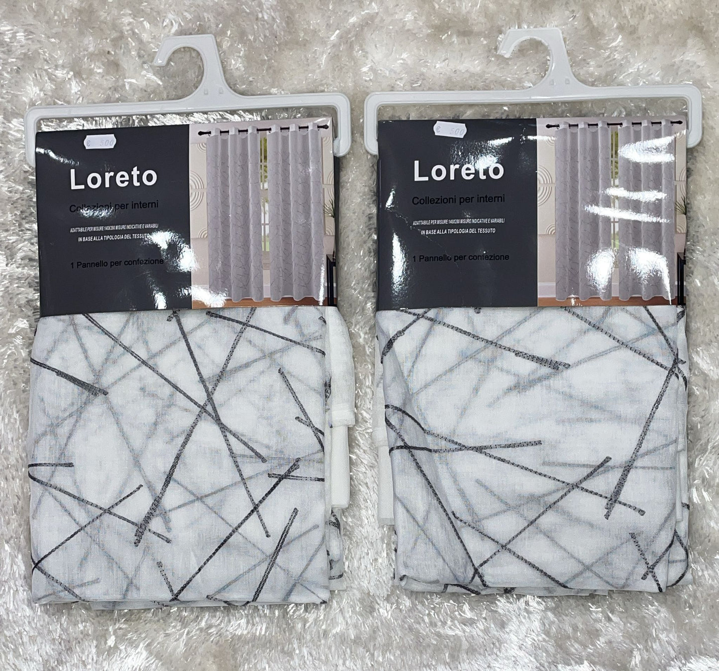 Coppia di tende velate con anelli misura 140x280