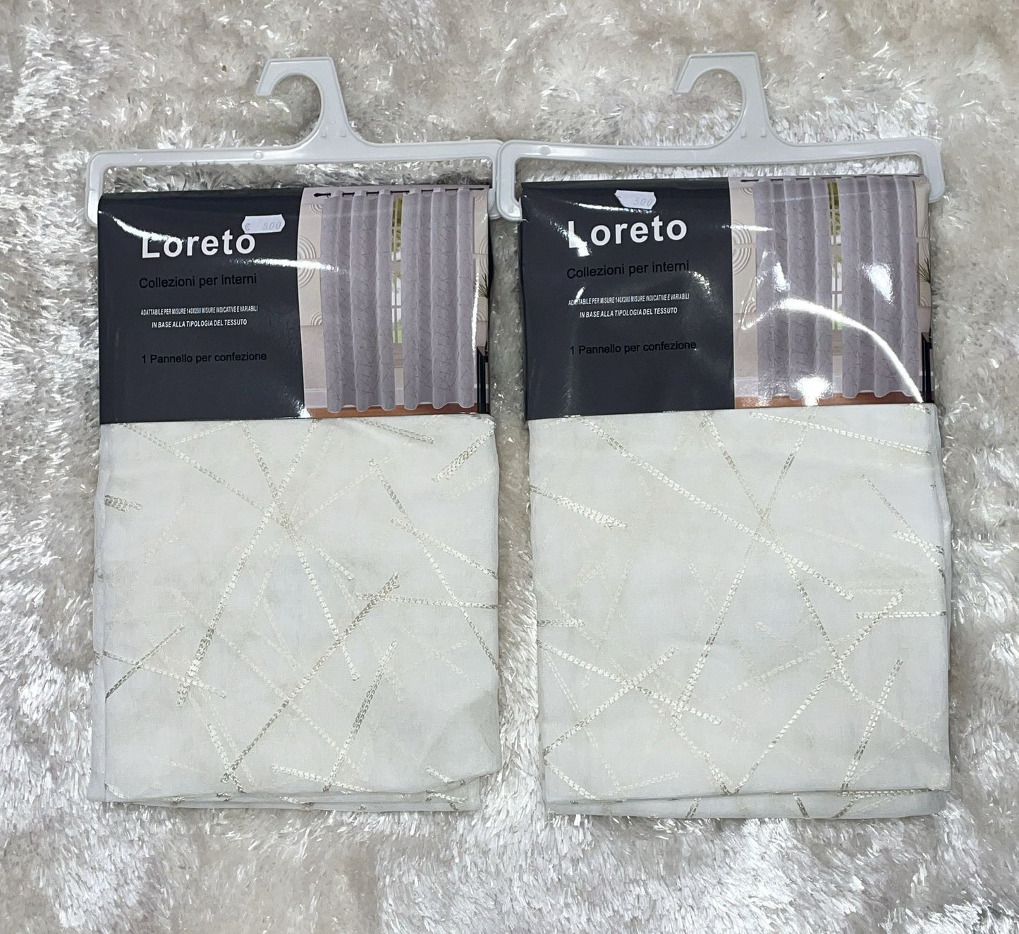 Coppia di tende velate con anelli misura 140x280