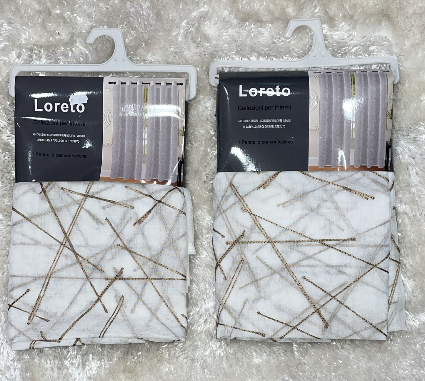 Coppia di tende velate con anelli misura 140x280