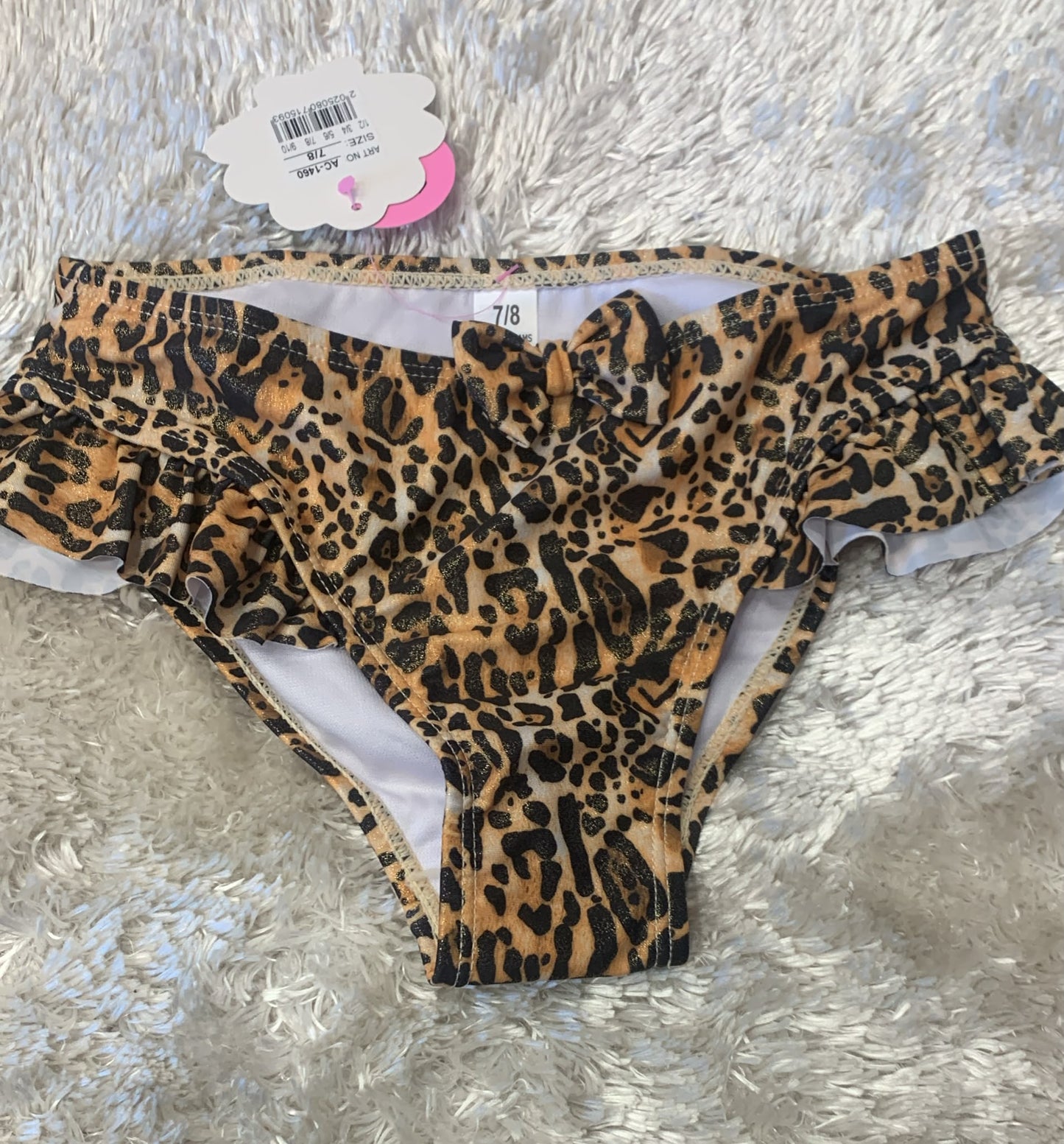 costume slip bimba  con fiocco in rilievo  fantasia leopardata ( l'articolo non può essere cambiato )