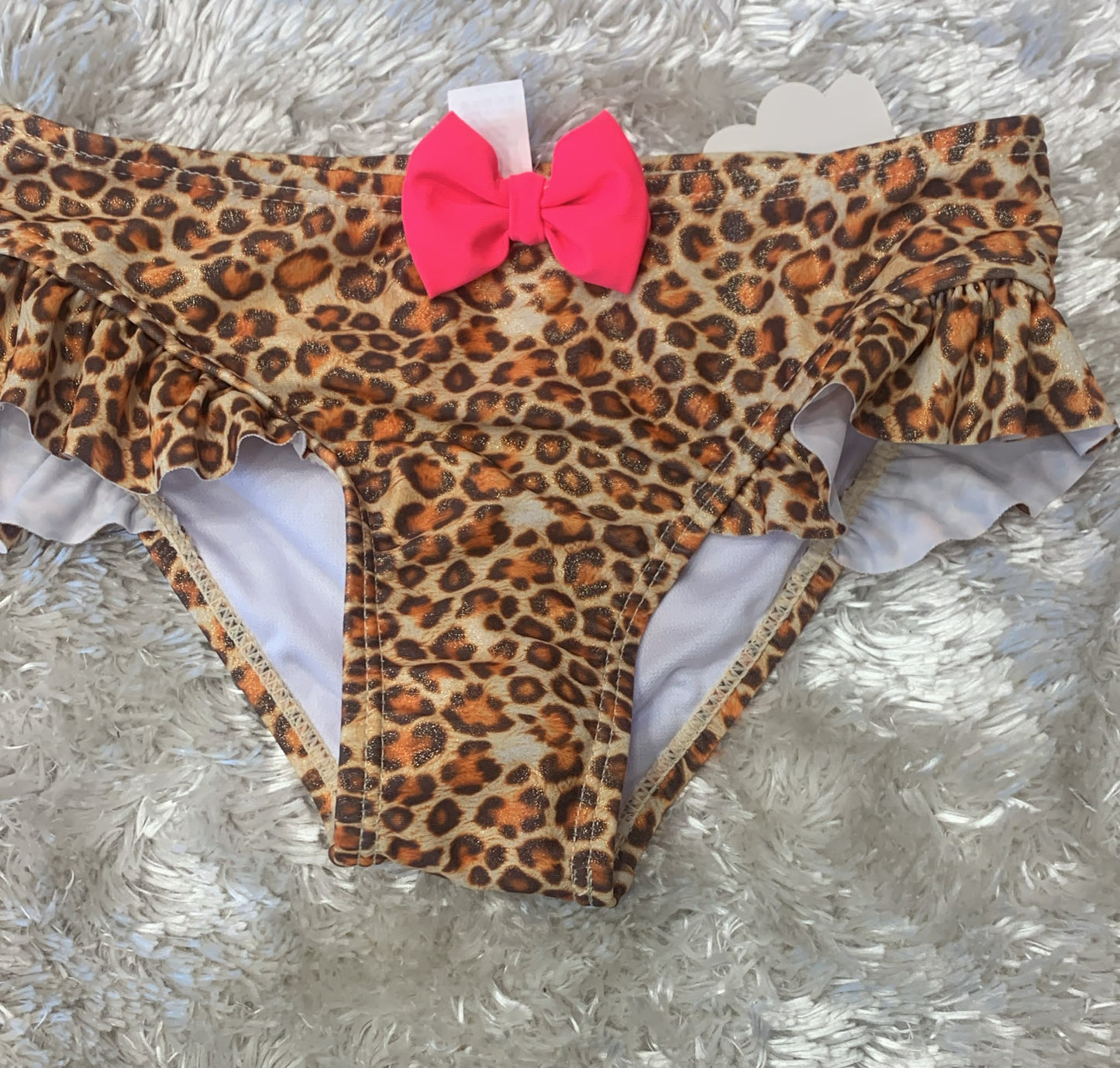 costume slip bimba  con fiocco in rilievo  fantasia leopardata ( l'articolo non può essere cambiato )