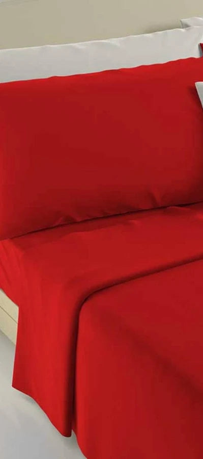 Completo letto matrimoniale tinta unita  in puro cotone . lenzuola sopra  250x290 cm lenzuolo sotto con angoli maxi 175x200 2 federe 52x82